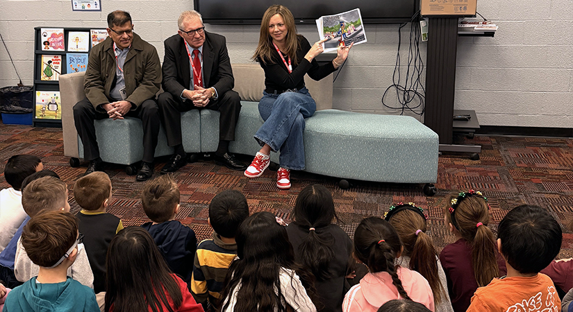 Students listening to a book.