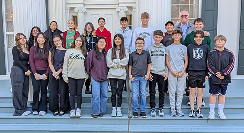 Students standing in front of Drumthwacket
