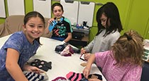 Students sorting socks