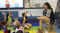 Students listening to their teacher.