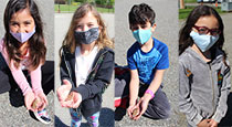 Students holding butterflies