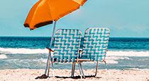 Beach chairs and an umbrella.