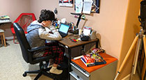 Student working at a desk.