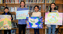 Students holding their peace posters.