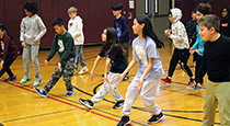 Students dancing in the gym.