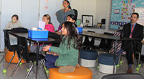 Students watching a smartboard