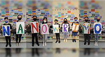 Students holding signs.