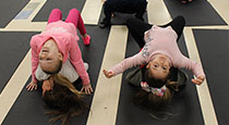 Students performing yoga