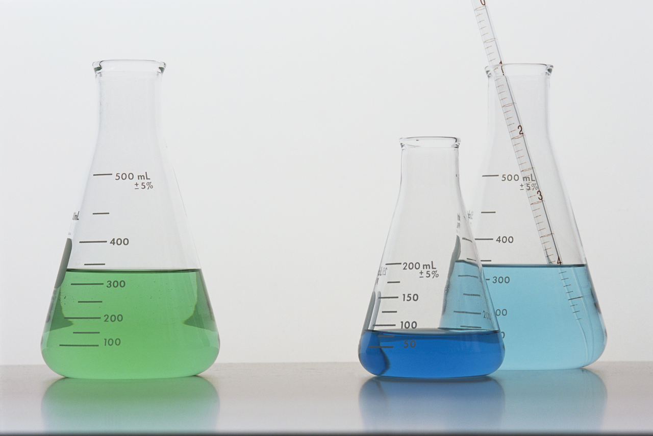 Beakers with different colored liquids