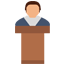 A person behind a podium